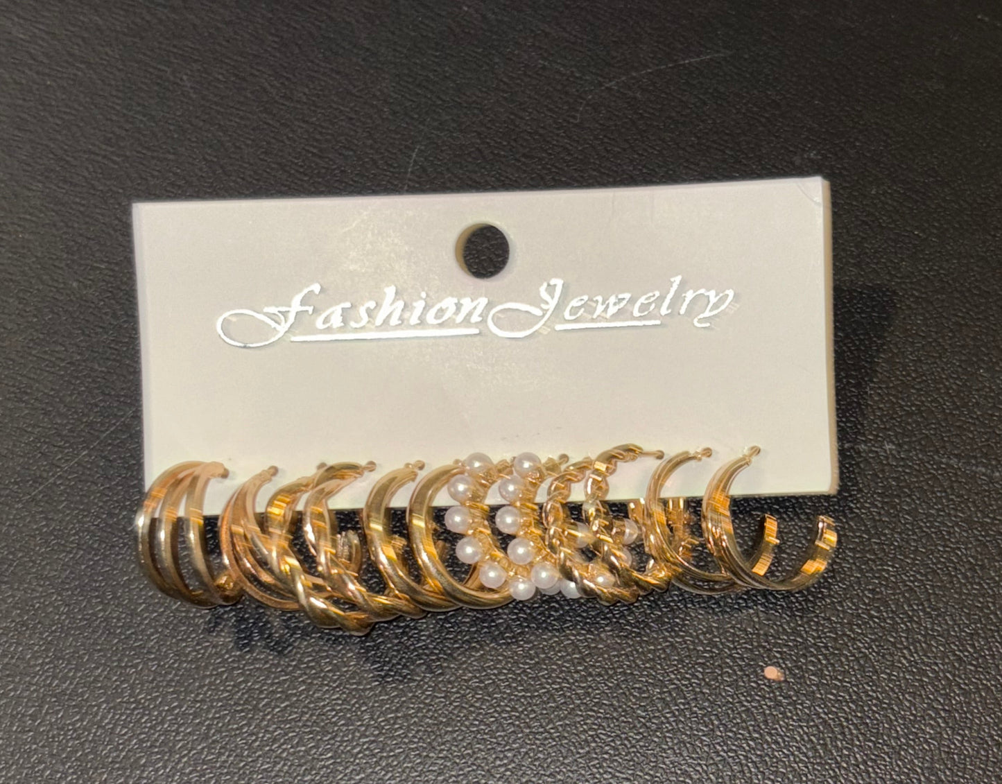 6 pairs of Gold Toned Earrings