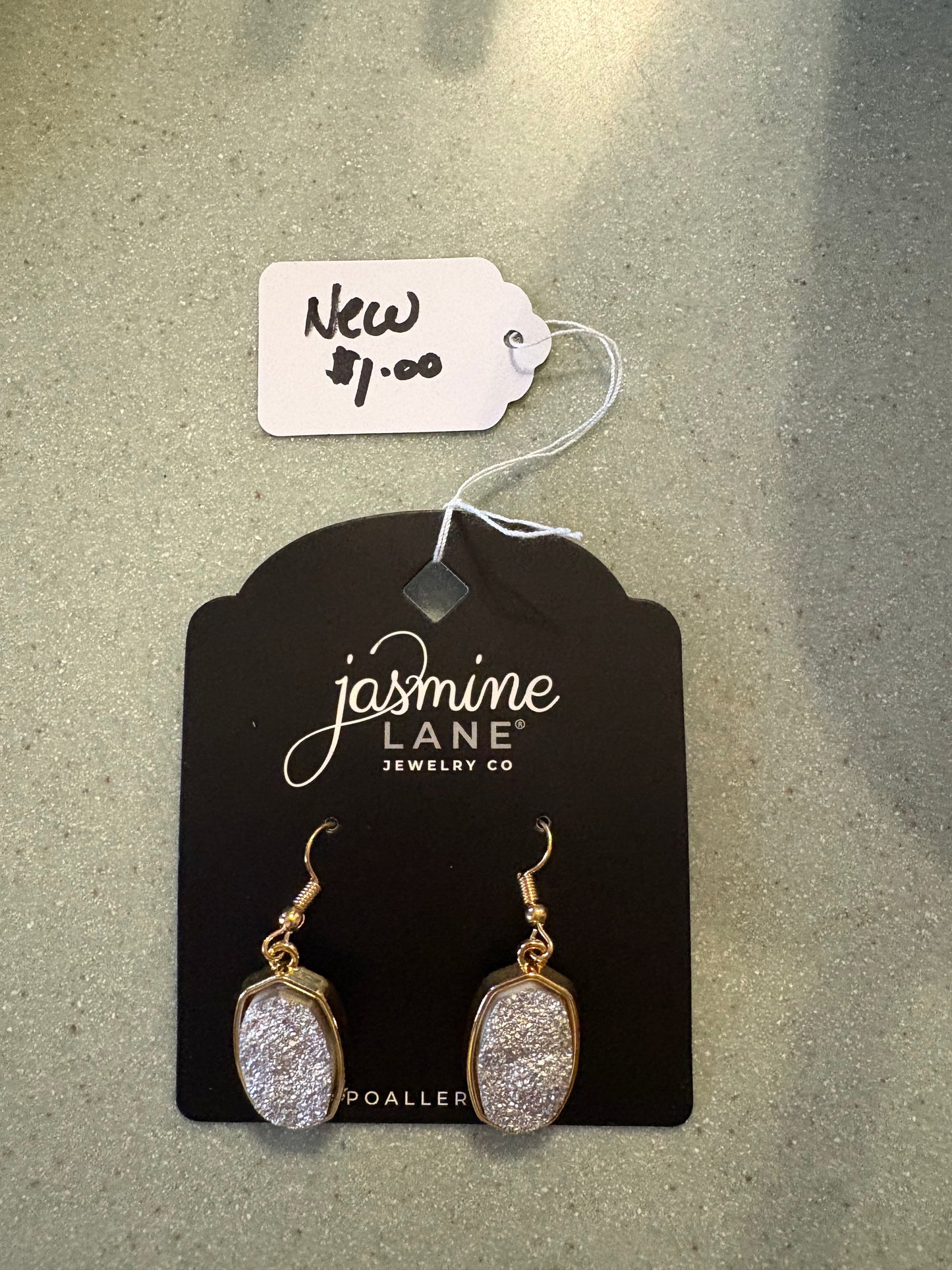 Silver rock style earrings with gold setting. Hypoallergenic. Jasmine Lane jewelry company.