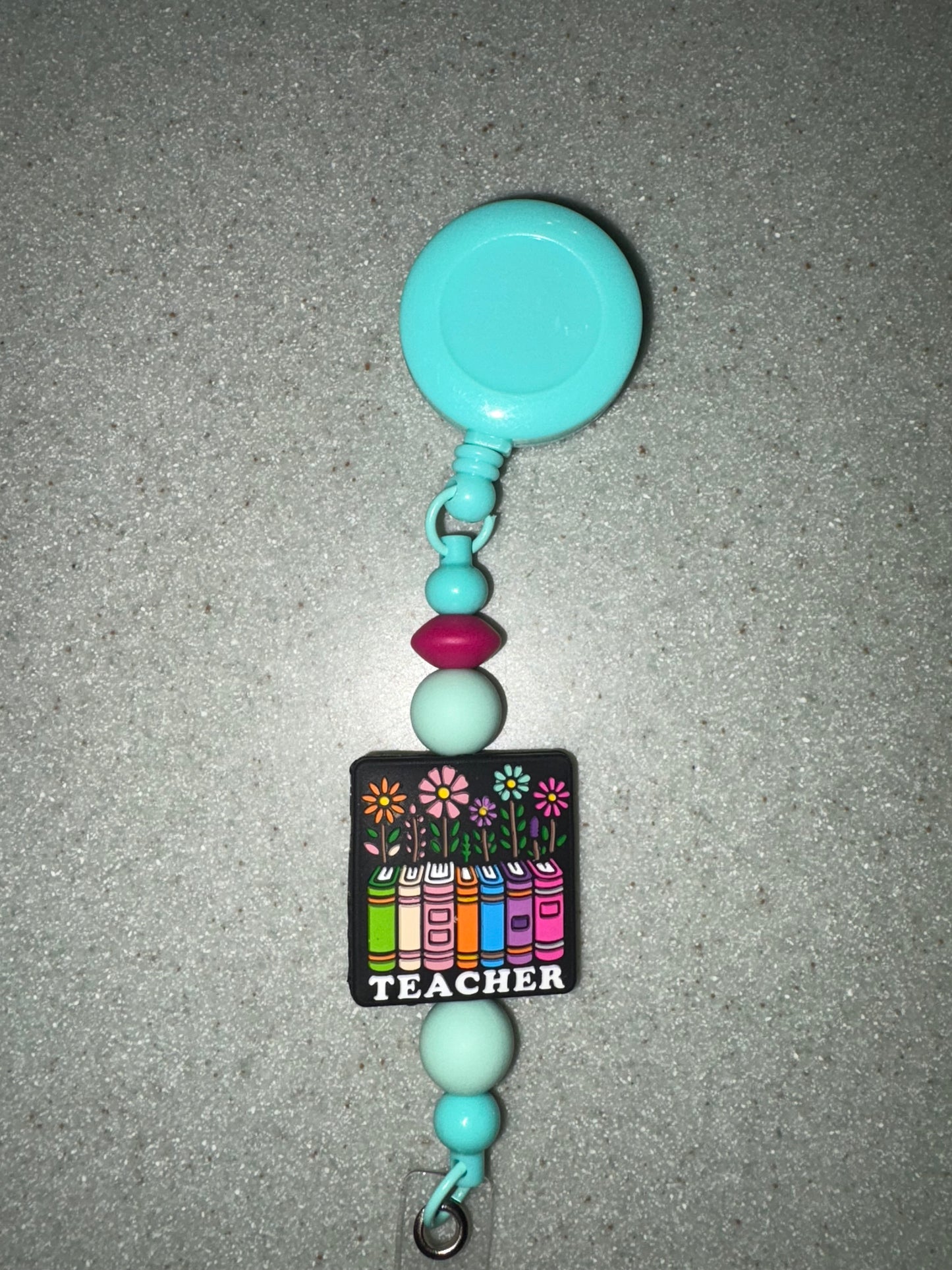 Teacher badge reel