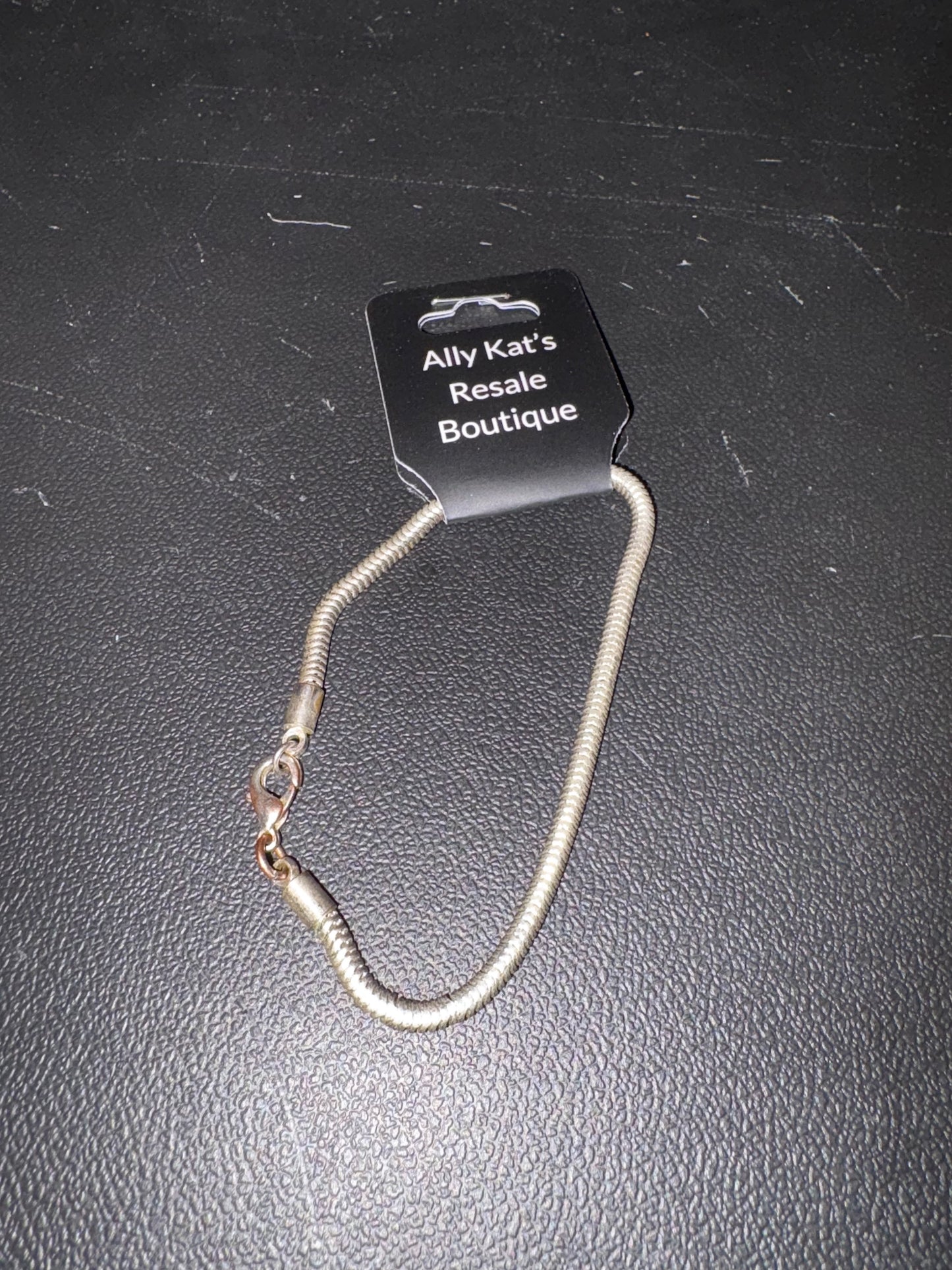 Silver and Gold Toned Charm braclets