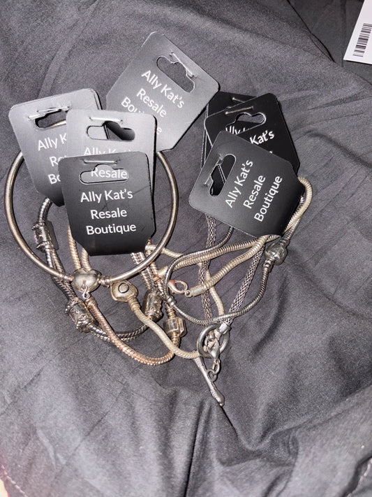 Silver and Gold Toned Charm braclets