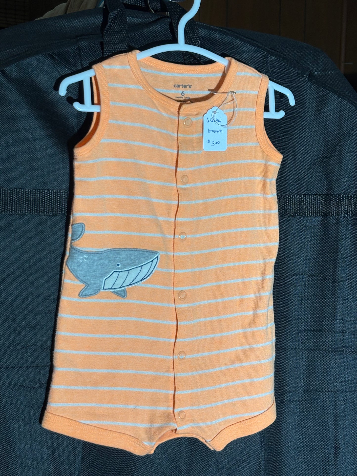 Size 6 month orange striped one piece