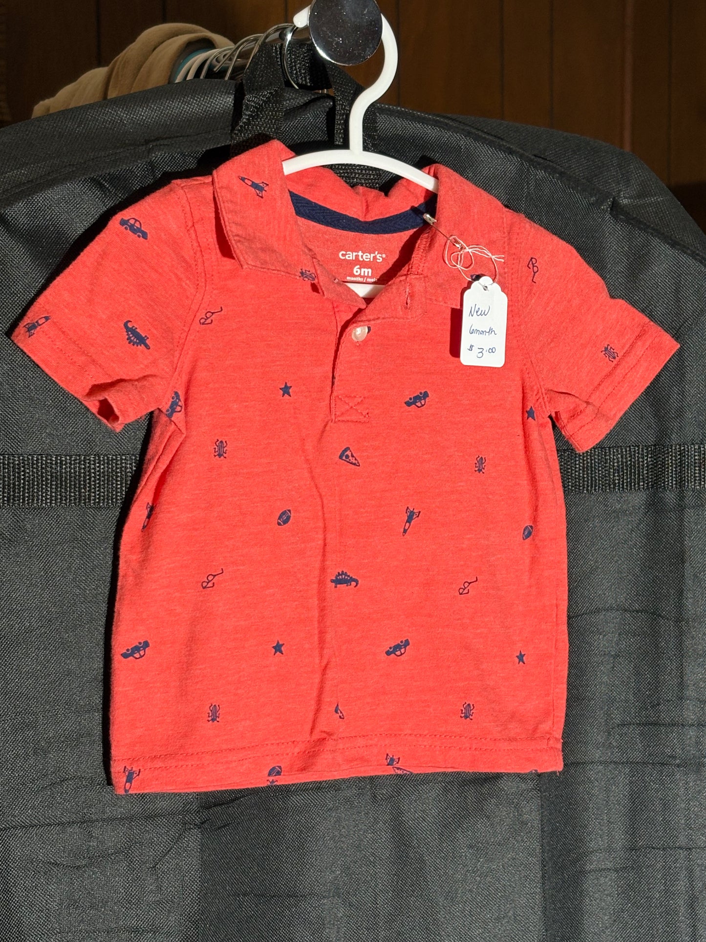 Size 6 month Carter brand red orange T-shirt with collar ￼