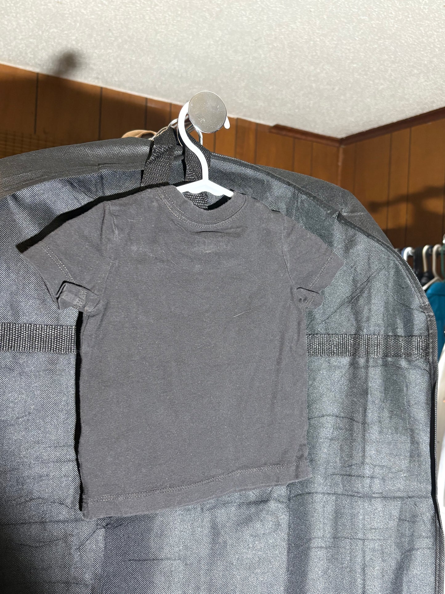 Size 6 month, OshKosh black T shirt