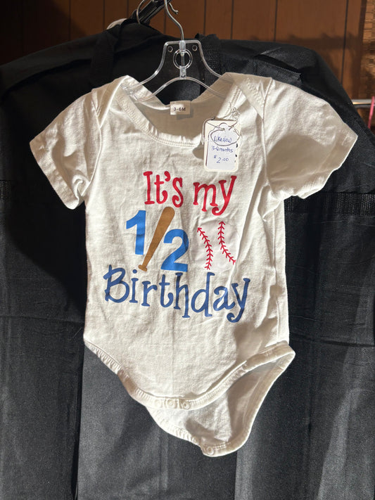 Size 3-6 month, white onesie “it’s my 1/2 birthday” baseball themed