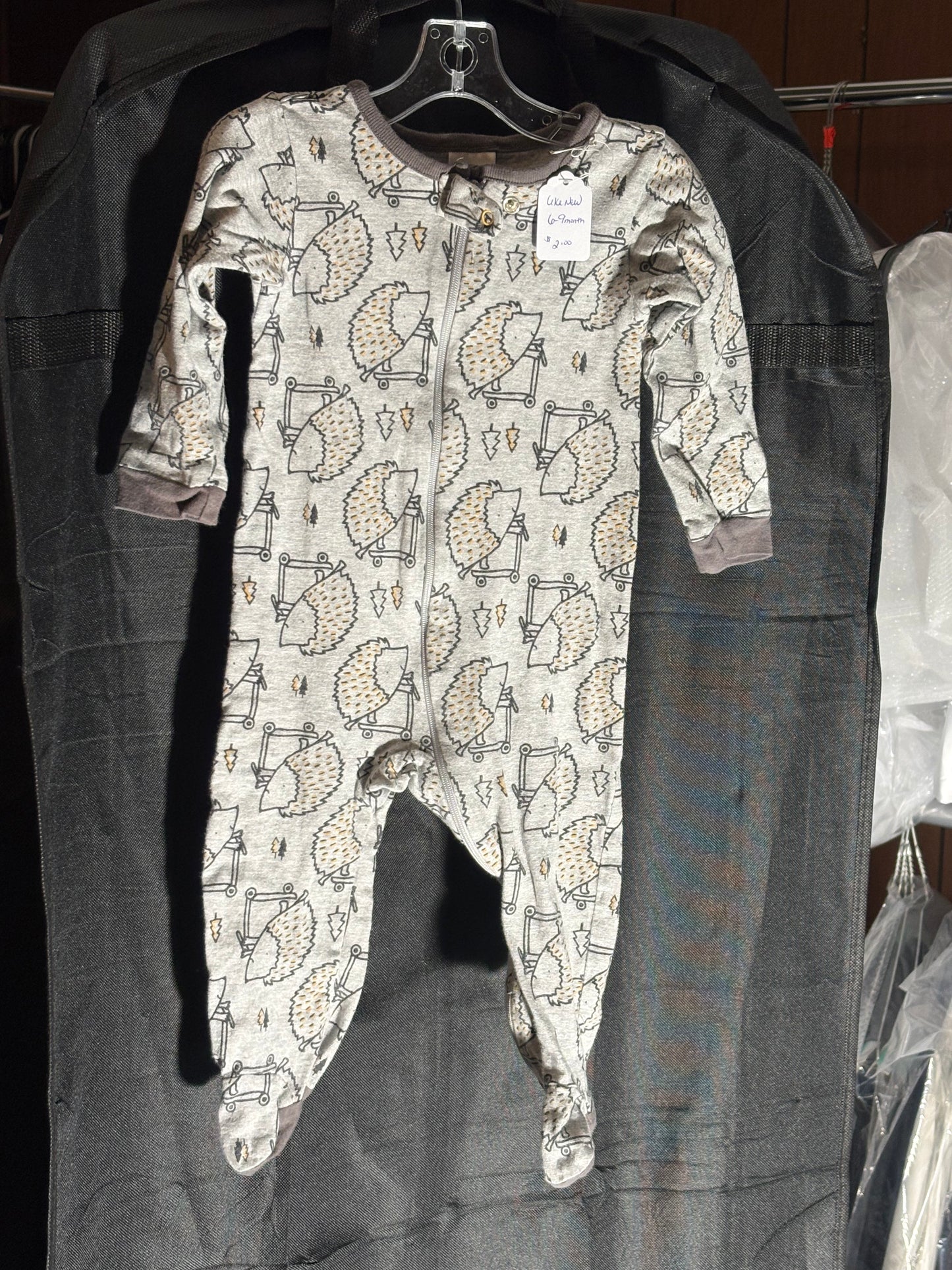Size 6-9 month, Gerber sleeper, Gray with hedgehog on scooter design