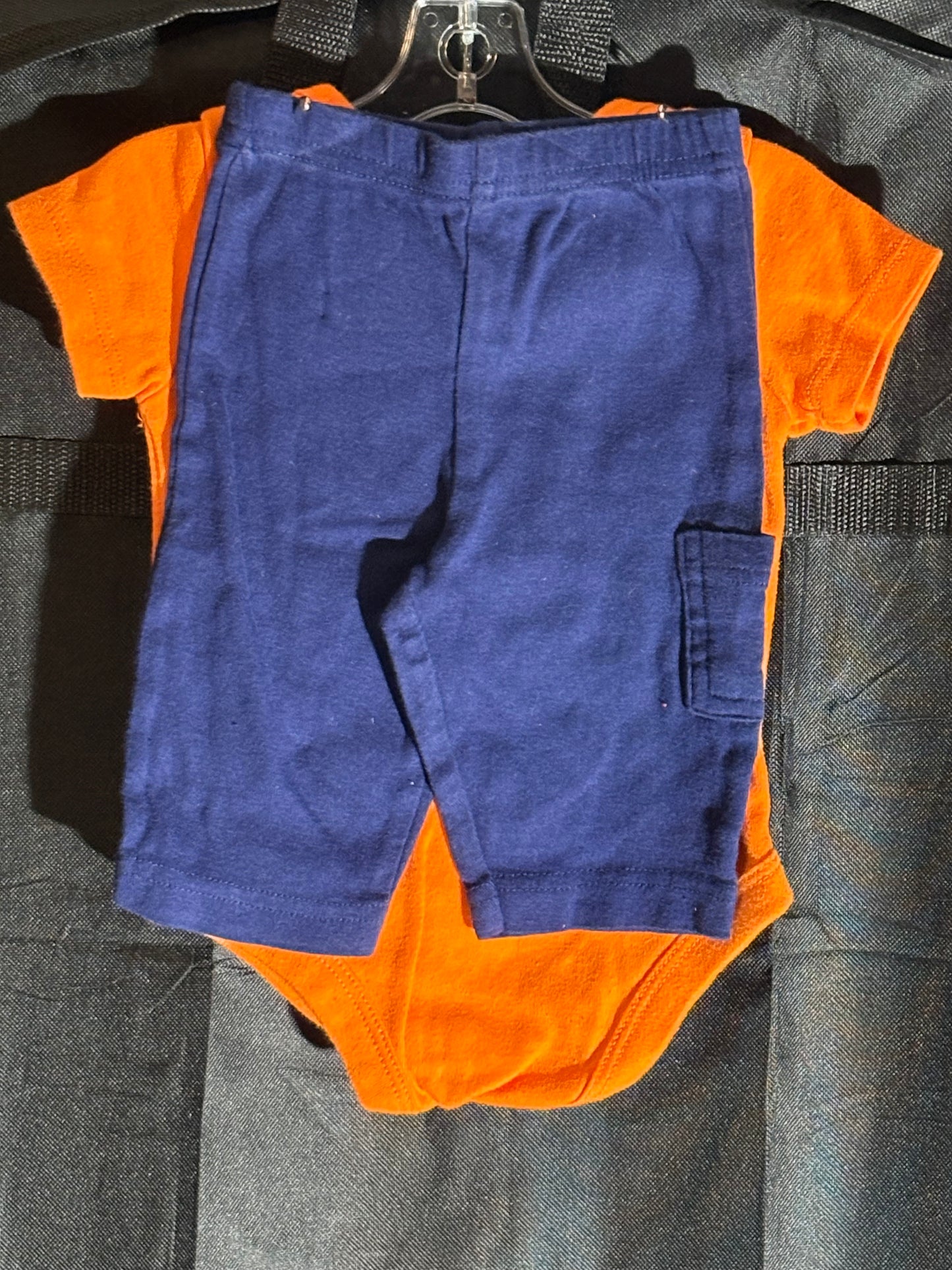 Size 0-3 month, Faded Glory outfit, orange and navy, “Dads knows a lot but mommy know everything”
