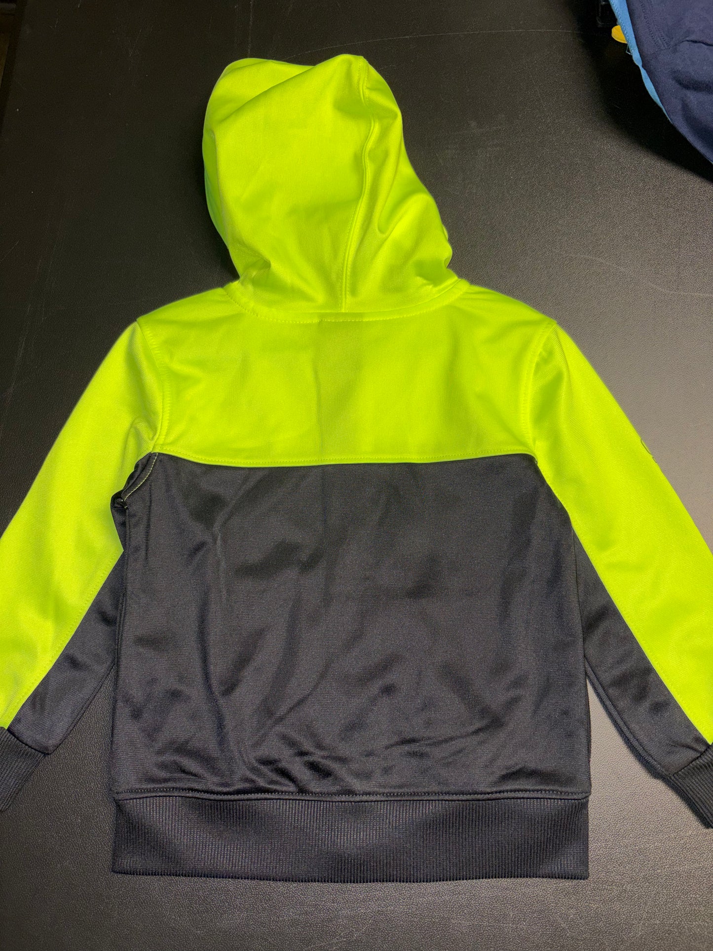 Size 24 month, Under Armour yellow and black zip up hooded jacket