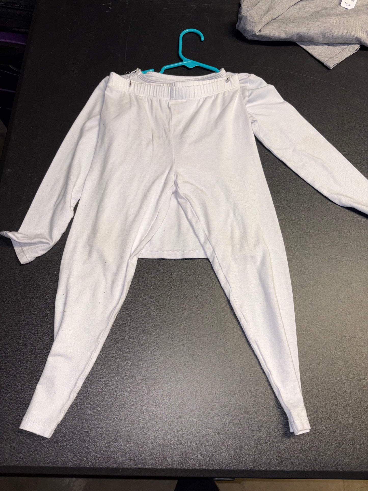 Size xsmall 4-5, white long underwear, imperfections on elbows